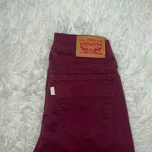 Maroon Levi’s jeans